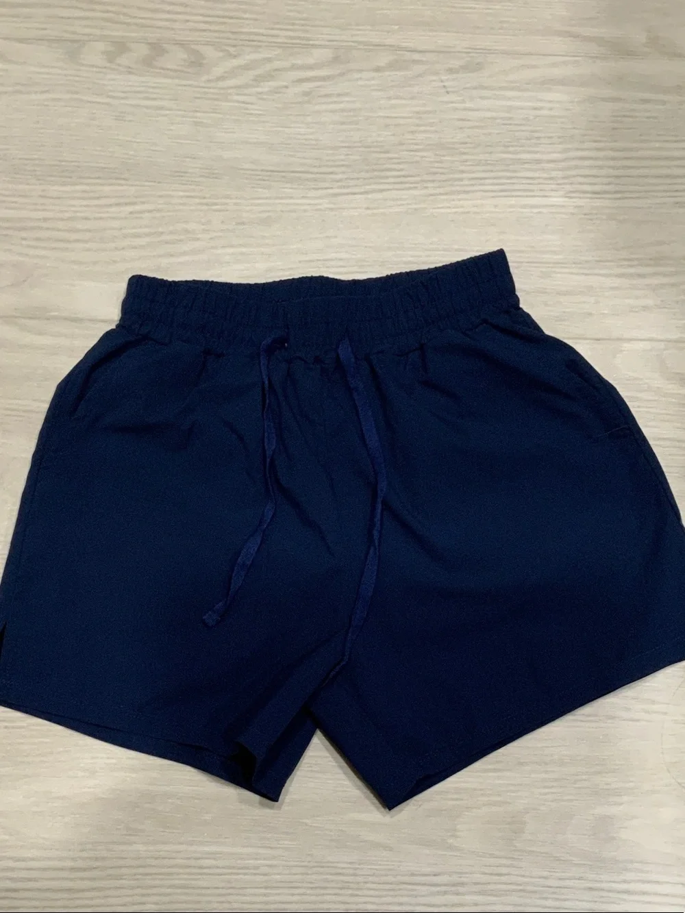 Athletic set. Kids Navy Blue Casual Shorts with light blue butterfly shirt.